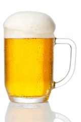 cold mug of beer with foam isolated on white background
