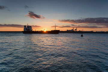 Fototapeta premium Sunset over the port of Burgas, Black Sea, Bulgaria.