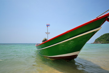 Naklejka premium Long tail boat at Phangan island, Thailand