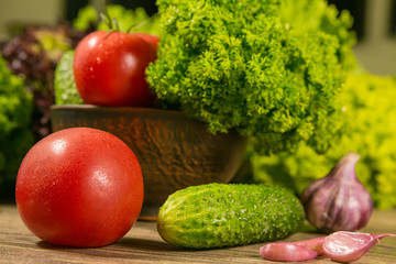 Organic vegetables in a bowl on a wooden table. Healthy Vegetarian Food