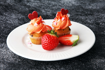 Delicious cupcake for Valentine Day. cake for Valentines day with chocolate and strawberries. Traditional homemade with red roses