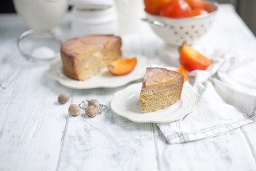 Homemade sweet pie with persimmon. Eastern sweets. Baking for breakfast. White background, free space for text or advertising.