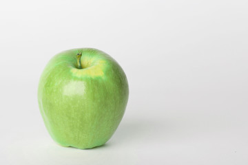 Green Apple for Snack on White Background with Room for Copy