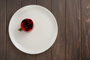 cake with jelly and currant on a plate