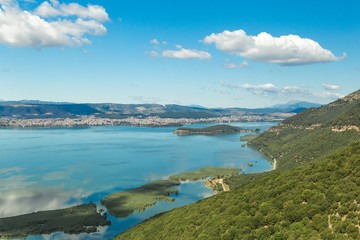 spring in Ioannina city Greece , lake Pamvotis , clouds sky