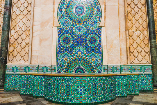 ow angle view of moroccan traditional water tap decorated with colorful shapes of mosaic
