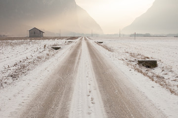 Lonely road in frost