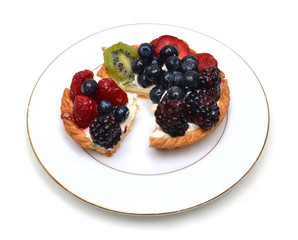 Fresh fruit tart in white plate