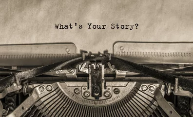  Wat is jouw verhaal? getypt op een oude vintage typemachine tekst. © gerasimov174
