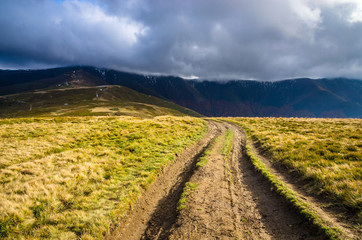 Fototapeta na wymiar Autumn mountains in cloudly day