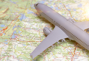 Fototapeta na wymiar Plane on the map. Traveling abroad, international flights, flight, airlines.