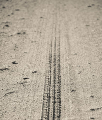 single tire track that disappears