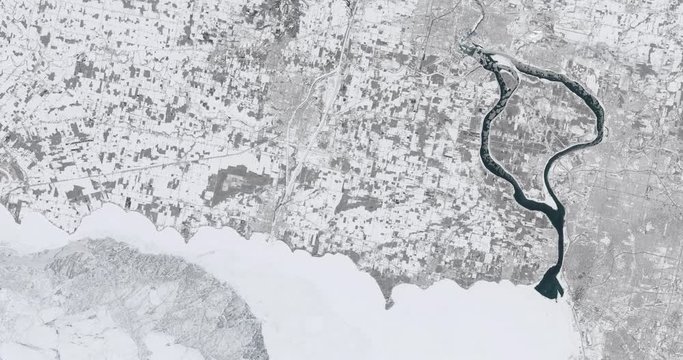 Slowly rotating zoom out from a frozen Lake Erie, 2017. Reversible and can be rotated 180 degrees. Elements of this image furnished by USGS/NASA Landsat 