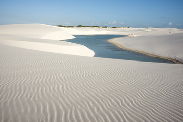 Lencois Maranhenses National Park, Barreirinhas, Brazil, low, flat, flooded land, overlaid with large, discrete sand dunes with blue and green lagoons