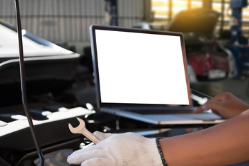 Mechanic repairing a car  in garage  Auto repair car engine, close u