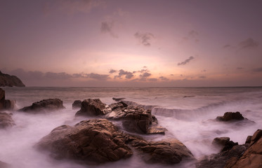 Dramatic sunrise view of Rocky Hang Rai beach, Vietnam