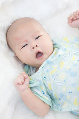 Close-up of asian baby boy sleeping .