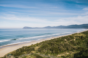 View of Bruny Island beach in the afternoon.