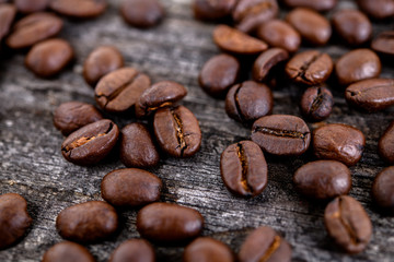  coffee beans on wooden ground