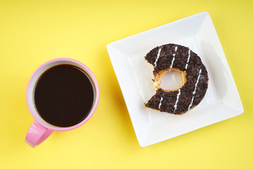 Assorted donuts served on a pastel background