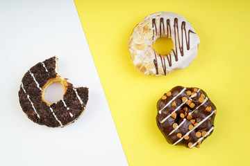 Assorted donuts served on a pastel background