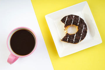 Assorted donuts served on a pastel background
