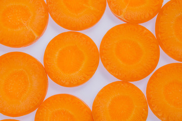 top view of fresh orange carrot slice background