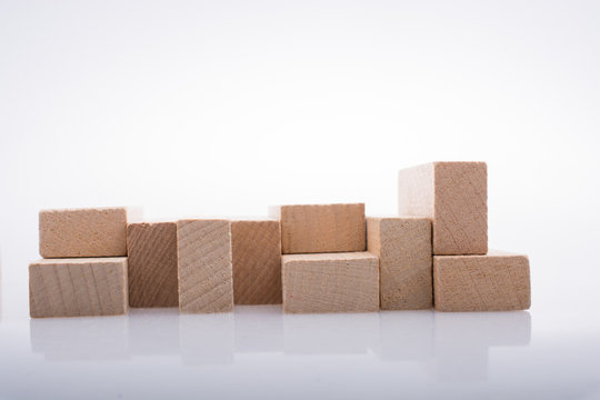 Wooden domino blocks on white background