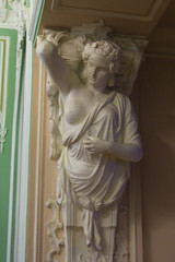 Statue of Caryatid supporting ceiling.