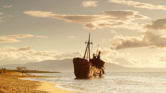 Greek coastline with the famous rusty shipwreck n Glyfada beach near Gytheio, Gythio Laconia Peloponnese Greece. Time lapse 4K