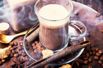 Hot coffee cup with coffee beans