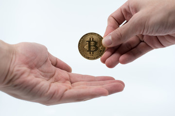 hand with bitcoin isolated on white background