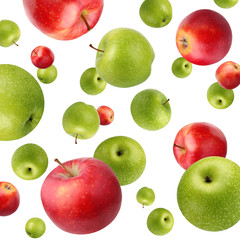 Fruit background with green and red apples on white. Flying (falling) fruit.