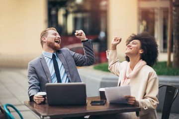 Business people using laptop outdoor. Business and coworker concept