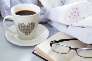 Bedroom on the bed, morning coffee. Valentine's Day. Happiness. A heart.