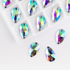 Precious stones crystal color in the pallet on a white background.