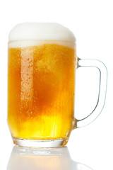 cold mug of beer with foam isolated on white background