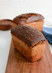 Fototapeta na wymiar Homemade rye bread on a wooden board.