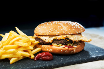 Cheese burger - American cheese burger with Golden French fries