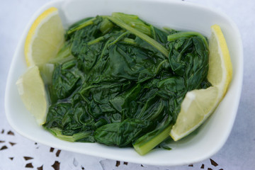 Cooked mangel, served with lemons.