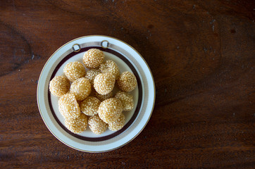 Onde-onde goreng pastry snack in Indonesia on plate with copy space right.
