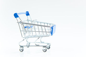 Mini shopping cart blue color on white background