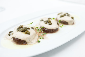 Sliced veal with sauce