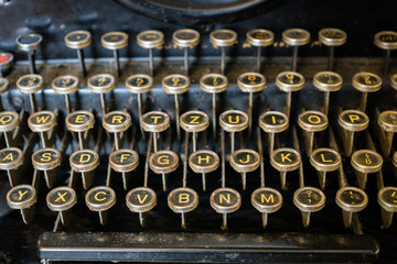 old typewriter keyboard close-up - vintage antique style typewriter