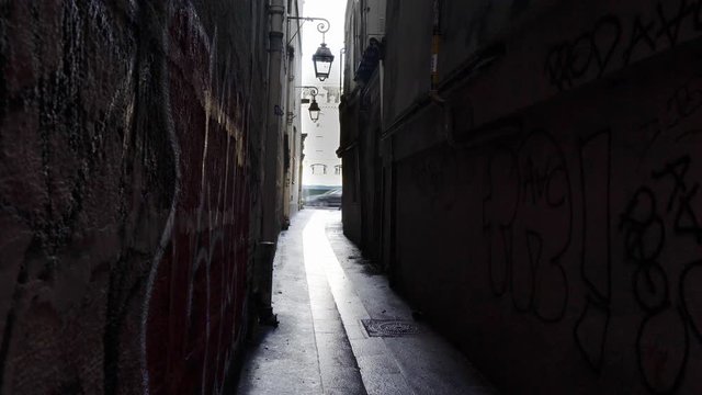 Paris,France-January 22, 2018: View of Rue du Chat qui Peche, the narrowest street in Paris, 26 meters long by 1.8 meters wide, from Rue de la Huchette. . 