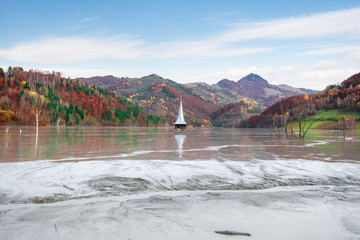 Submerged church. Drowned village at Geamana lake next to gold mine in Romania. Cyanide pollution...