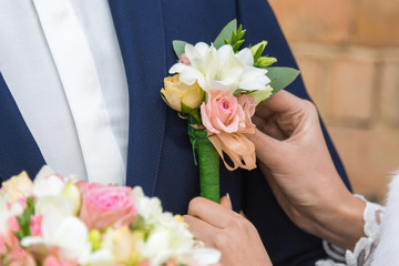 the bride holding the wedding bouquet