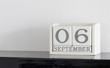 White block calendar present date 6 and month September