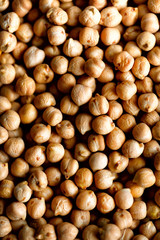 Raw organic dried chickpea texture background. Vegan healthy nutrition. Top view, copy space, healthy lifestyle concept.