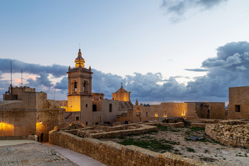 Night view of Citadel, The Cittadella in Maltese, also known as the Gran Castello, a citadel in...